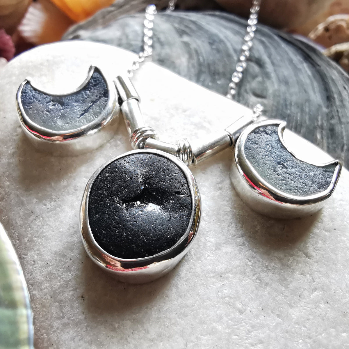 Genuine black and opalescent moon sea glass & sterling silver necklace.