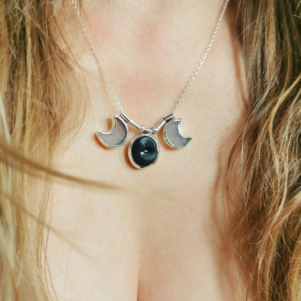 Genuine black and opalescent moon sea glass & sterling silver necklace.