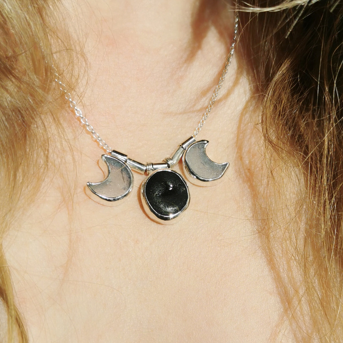 Genuine black and opalescent moon sea glass & sterling silver necklace.