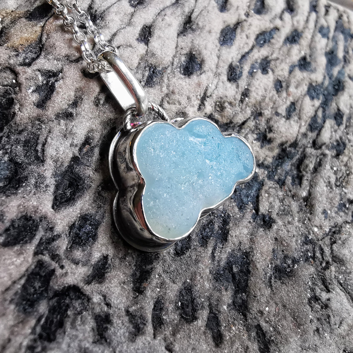 Opalescent sea glass cloud & sterling silver pendant.