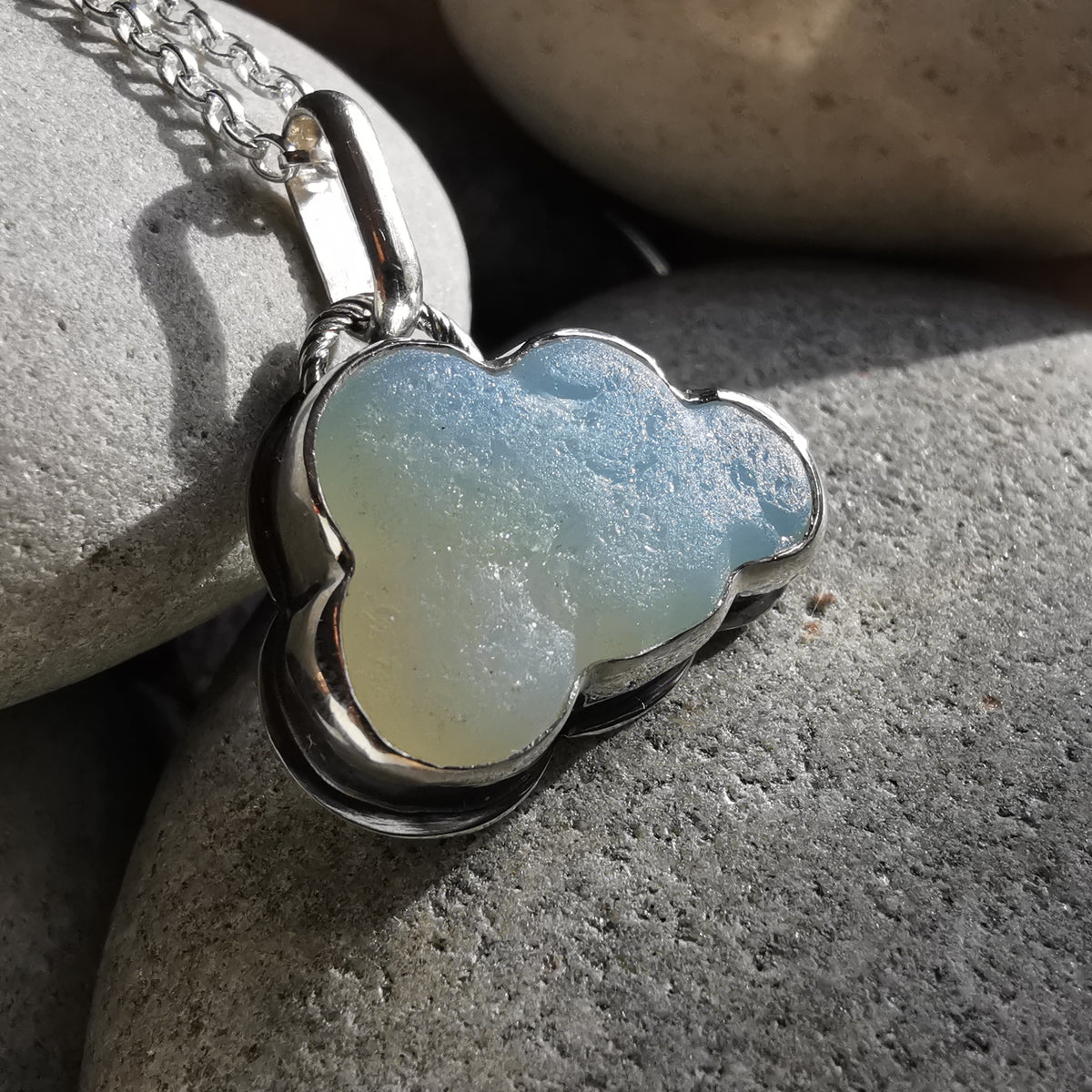 Opalescent sea glass cloud & sterling silver pendant.