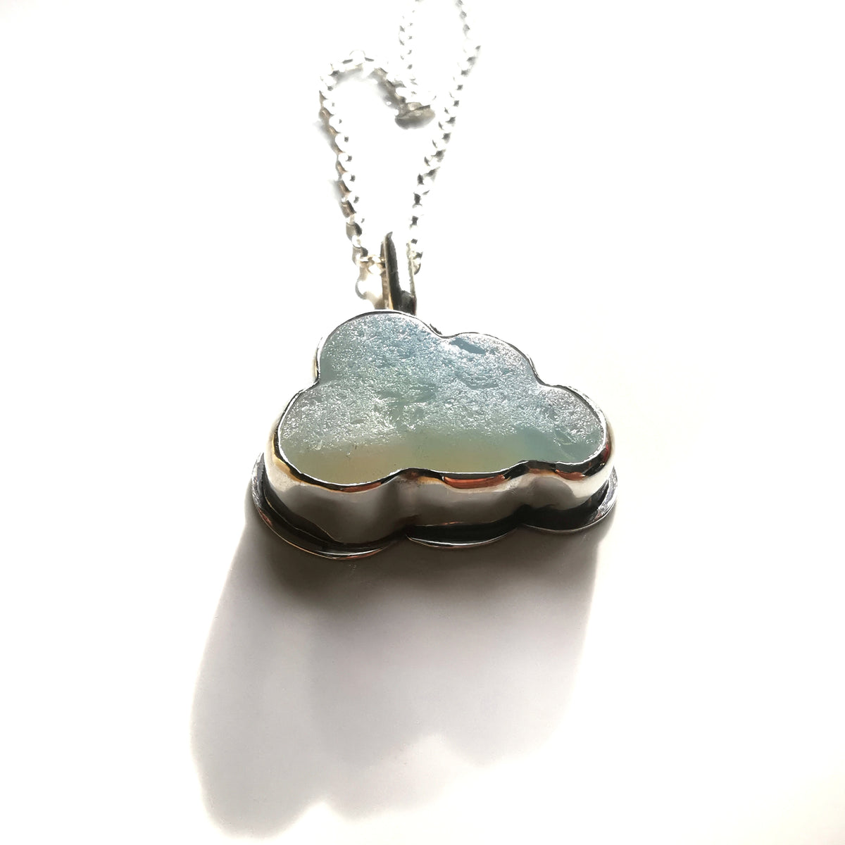 Opalescent sea glass cloud & sterling silver pendant.