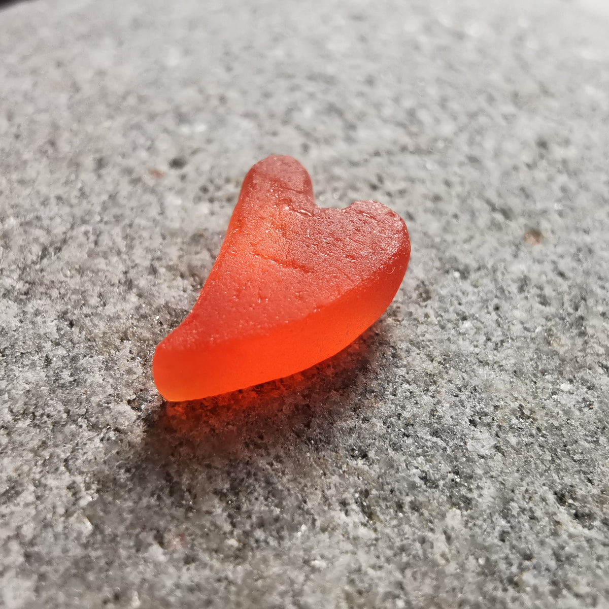 Tiny Scottish orange sea glass heart  & sterling silver pendant.
