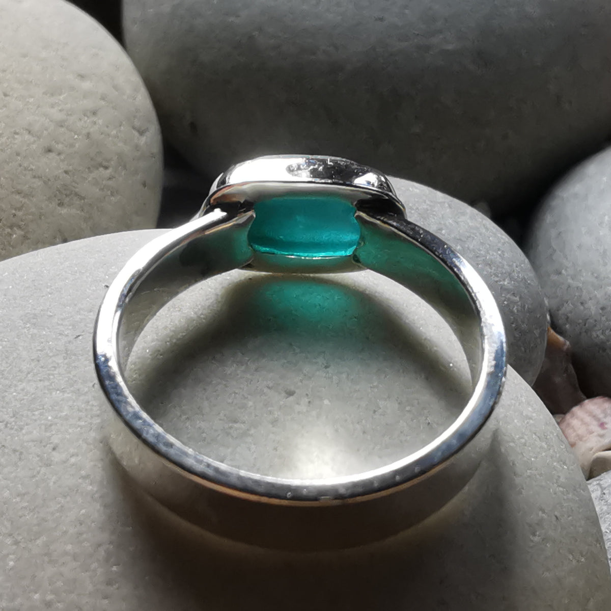 Genuine teal sea glass & sterling silver ring.