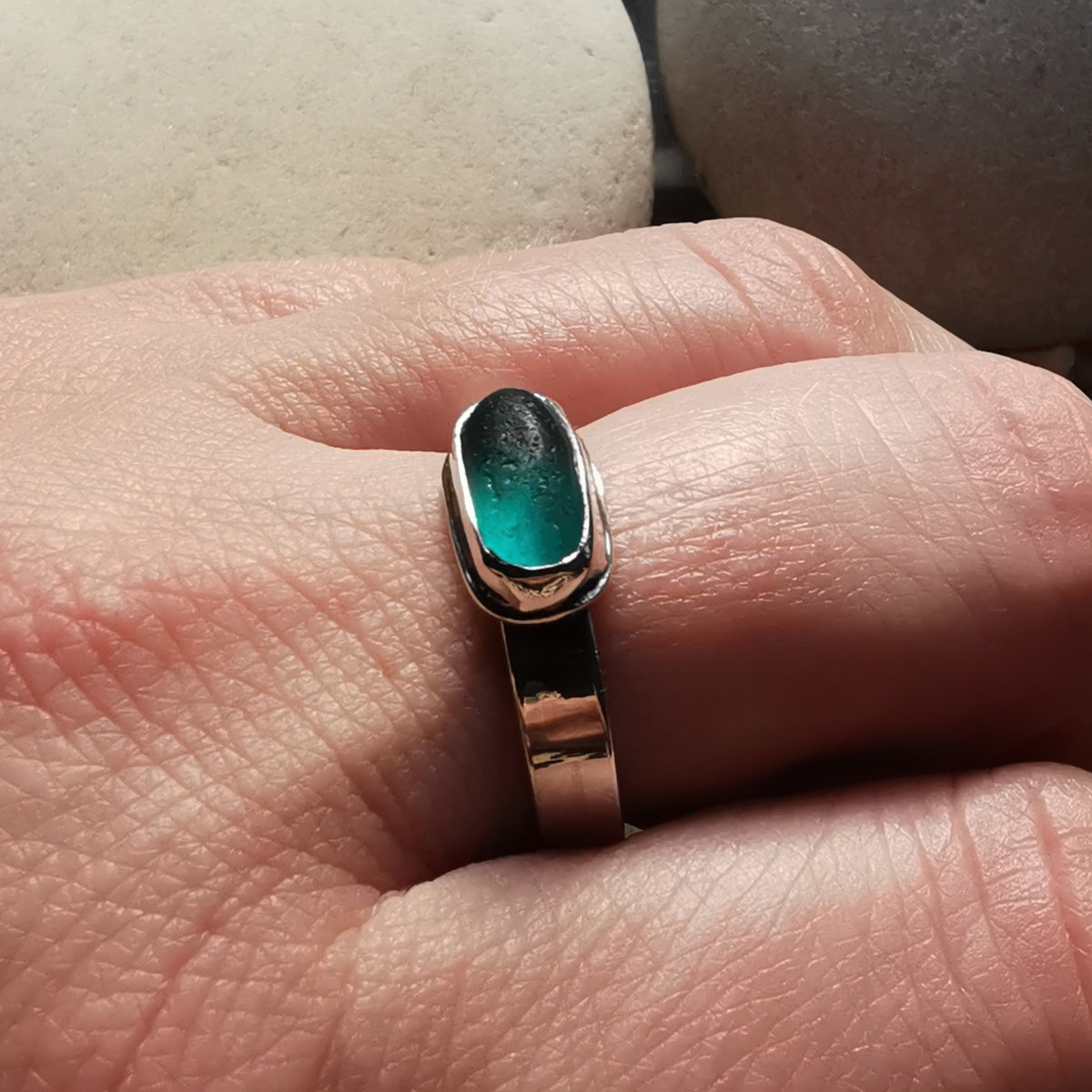Genuine teal sea glass & sterling silver ring.