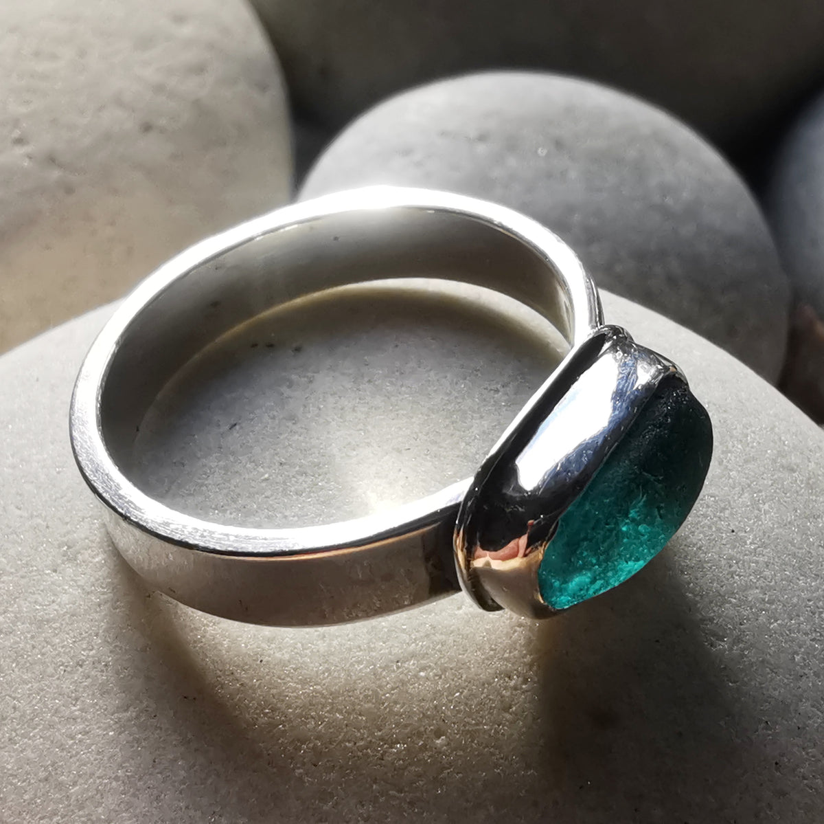 Genuine teal sea glass & sterling silver ring.