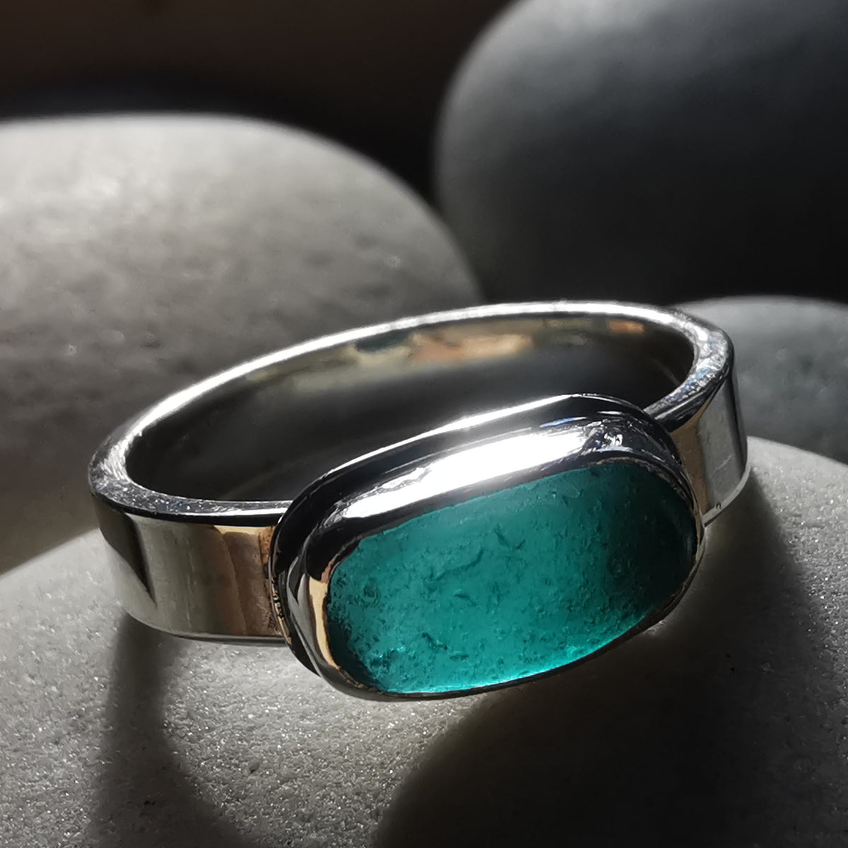 Genuine teal sea glass & sterling silver ring.