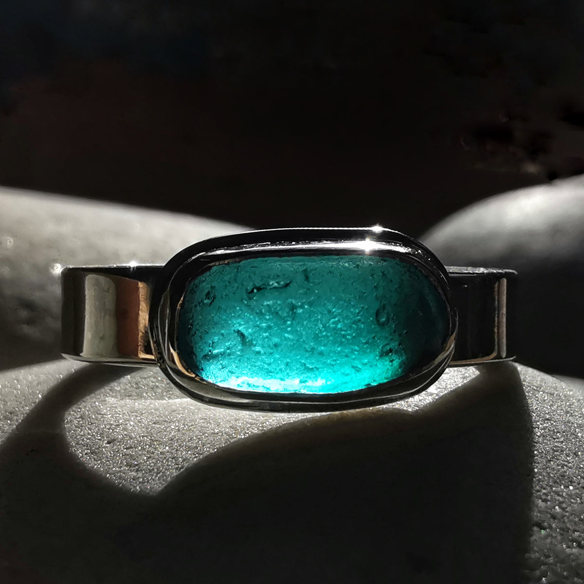 Genuine teal sea glass & sterling silver ring.
