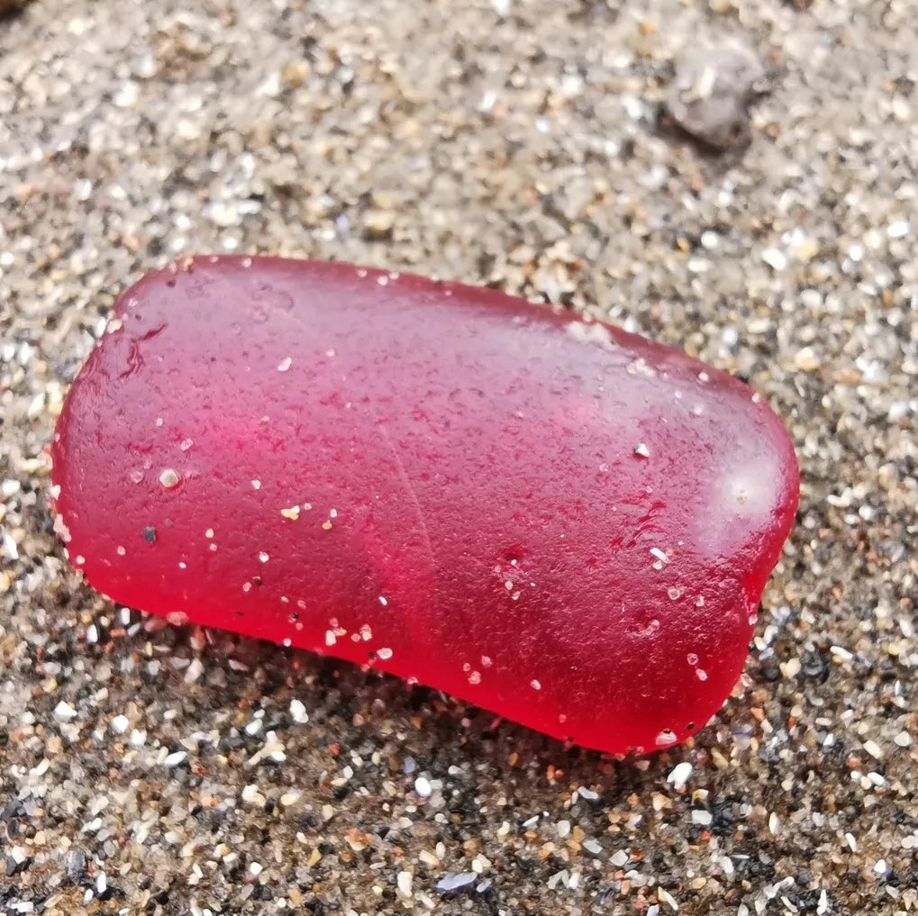 Scottish red sea glass & sterling silver pendant.