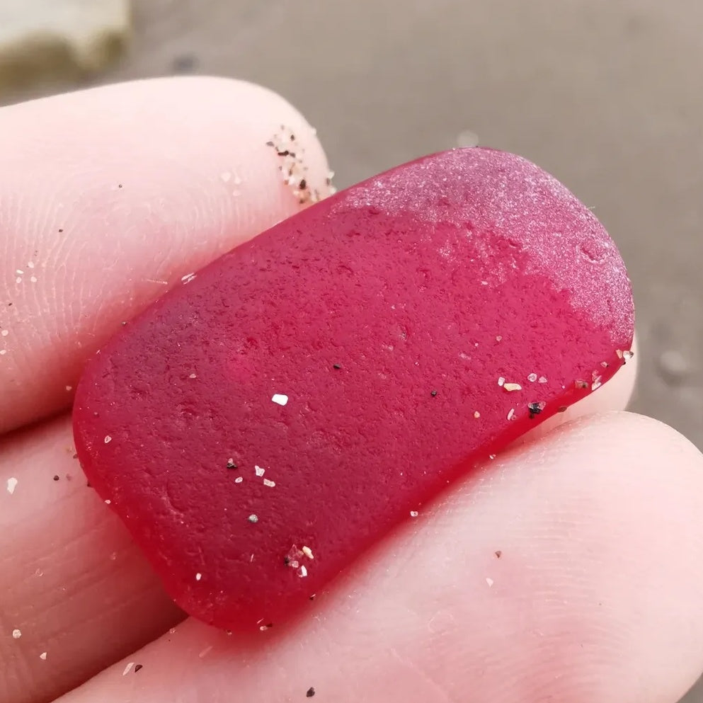 Scottish red sea glass & sterling silver pendant.