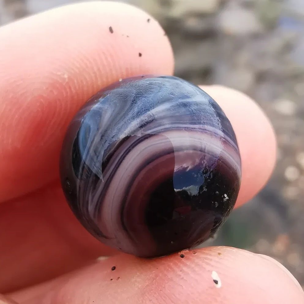 Genuine Scottish purple sea glass marble & sterling silver pendant.