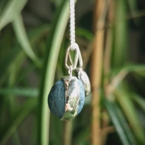 Seaham slag glass bubble and silver pebble wave pendants, sterling silver necklace