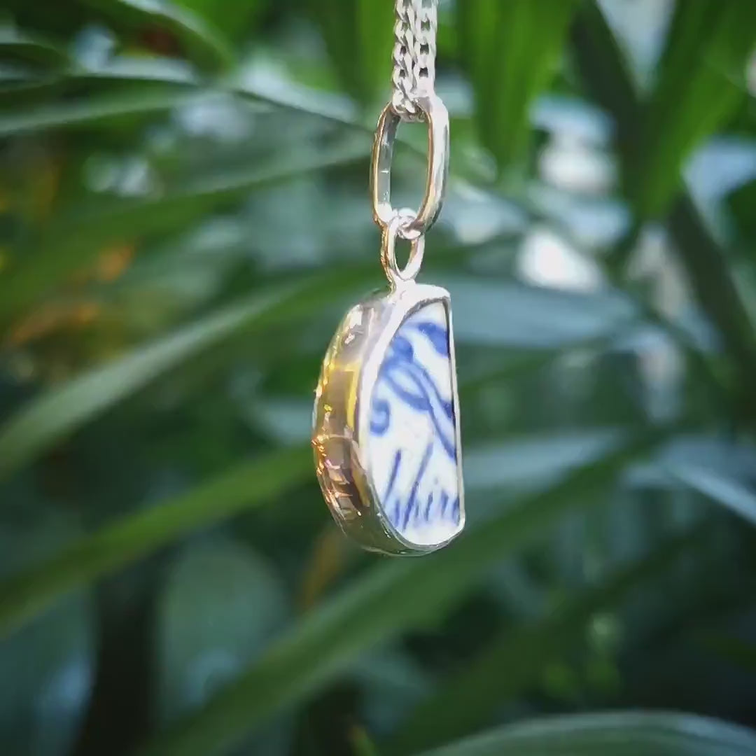 Scottish double sided beach pottery blue willow pattern pendant, silver necklace