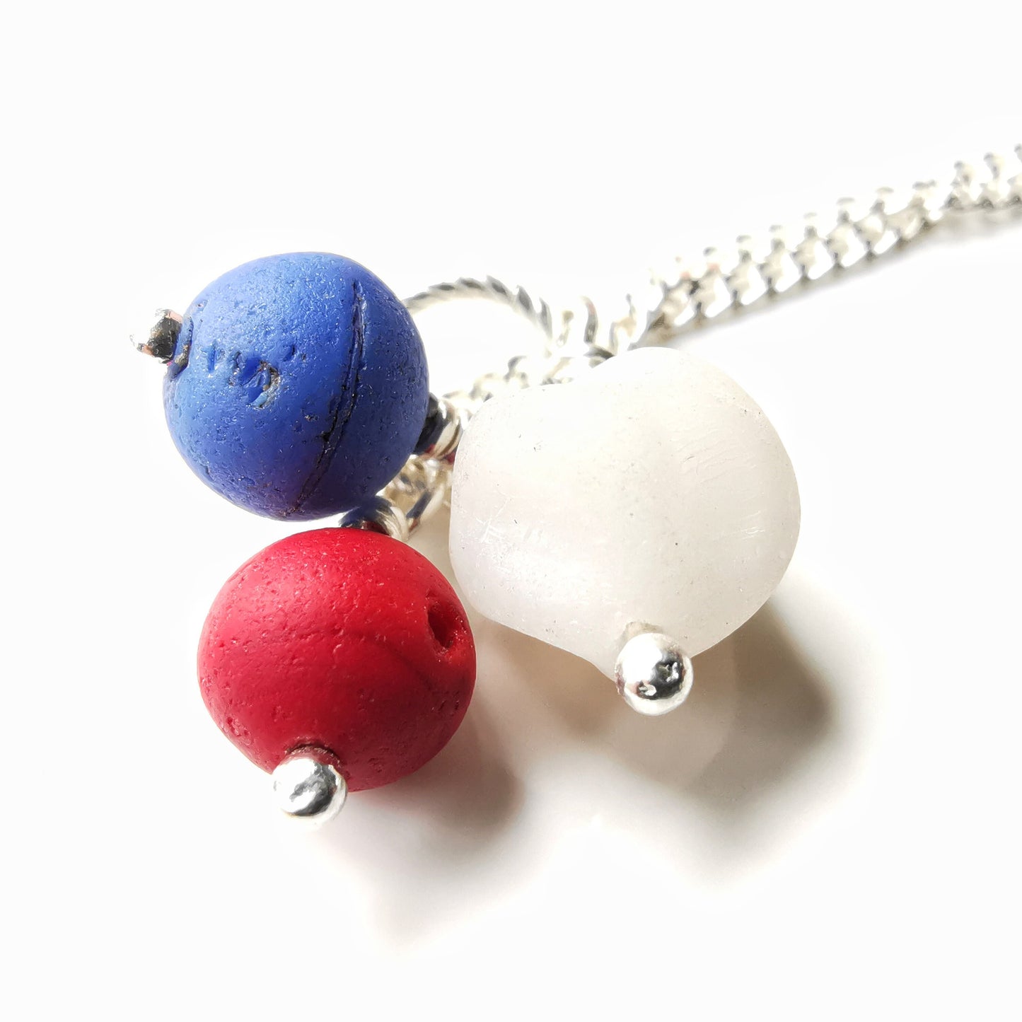 Scottish trio of sea glass beads in blue, red and white, sterling silver necklace - monopatin