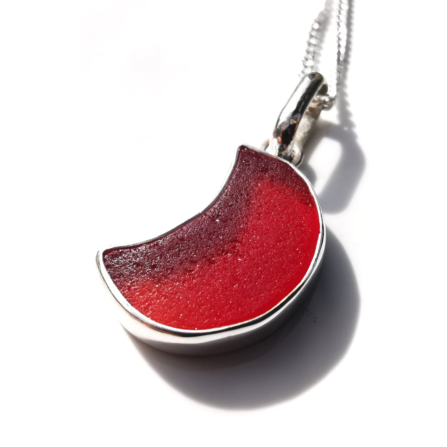 Scottish UV red amberina crescent moon sea glass pendant, sterling silver necklace - monopatin